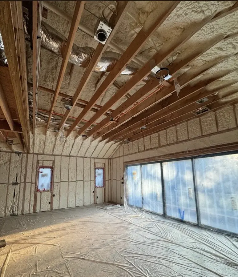 Interior walls and ceiling insulated with spray foam during new construction in Edna